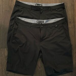 Two pairs of Travis, Mathew golf shorts